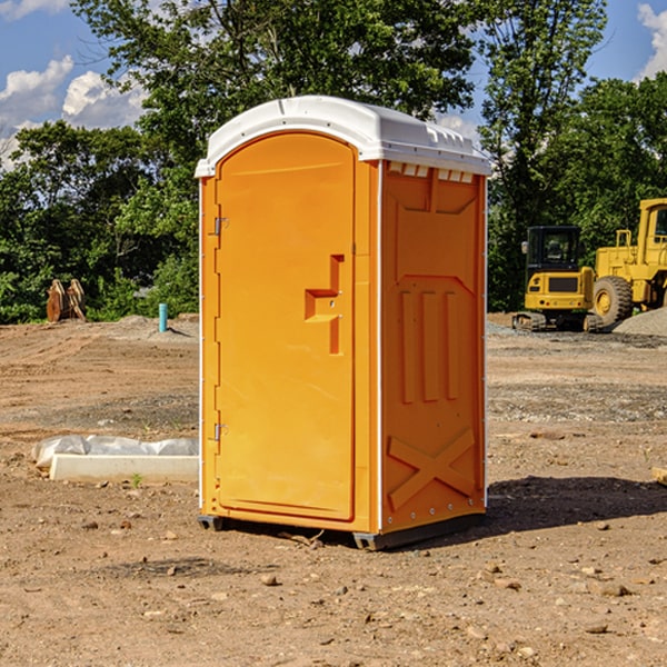 how often are the portable restrooms cleaned and serviced during a rental period in Denison